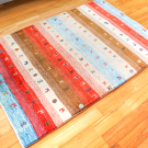 アマレ・153×100・赤色・青色・ヤギ・木・センターラグサイズ・使用イメージ画